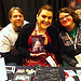 My booth mates, author Katie Cord (center) with her husband Tony & DM.