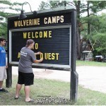 Alex and Nick prepare the Author Quest welcome sign