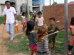 Every Friday, the priests pick up plastic trash around the office with the neighborhood children.