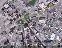 According to Google Earth, the window from which the photographs were taken is 2,281.67 feet away from the stacks.