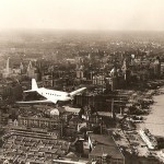 Maiden flight of CNAC's first DC-2 over the Shanghai Bund, 1935