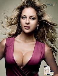 Her breasts are selling the shampoo Pantene.
