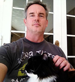 Author Michael R. Hicks and one of his cats, Sasha