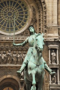 Equestrian statue of Joan of Arc (Jeanne d'Arc), by Paul Dubois, in front of the Church of St. Augustine (Église Saint-Augustin de Paris) in Paris, France. Source: Big Stock Photo