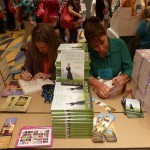Signing next to Amy at the Avon Open House