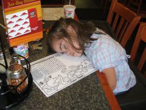 Julianna asleep at Pizza Hut in Hannibal