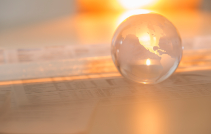 Crystal Globe On Financial Papers