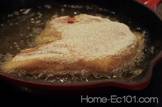 One Chop frying in a small pan
