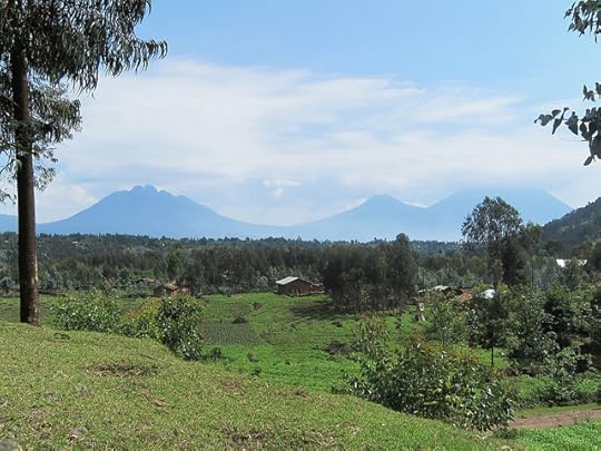 Steep Mountains and a Volcano in the Distance
