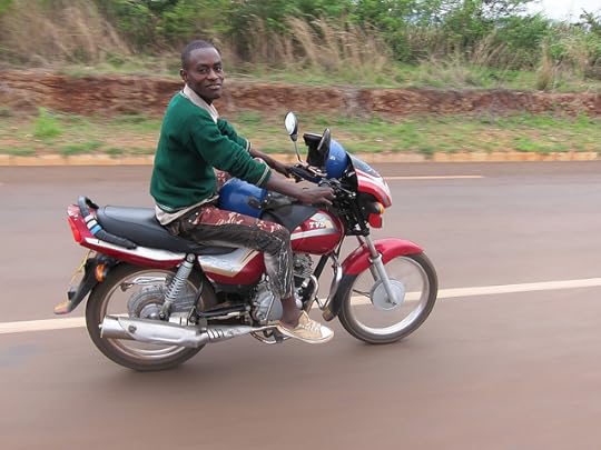 This fellow rode with me after crossing into Burundi for 20km. He even used his leg when we were climbing a hill to help me up.
