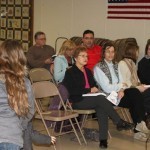 Visitors listen to Andrew Winkel's presentation
