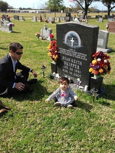 Damien Skipper and his daughter Ryan at the grave site of Ryan Keith Skipper (photo courtesy of the family).