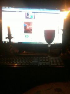 Pictured: A romantic candlelit evening with my true loves, Wine and Facebok