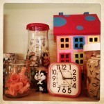 hands, skunk, clock, scrabble tiles