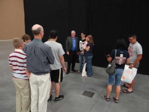 Ken greeting guests