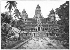 Angkor Wat with trees and Native huts