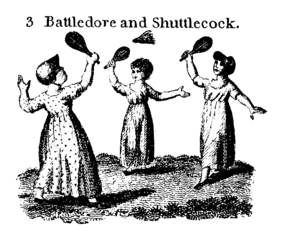 Three young girls play Battledore and Shuttlecock
