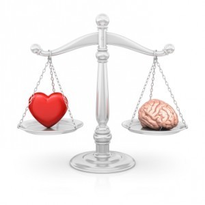 illustration of a heart and a brain on either side of a scale