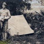 Corporal Kwiatkoski by his tent.