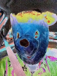 Photo of a person in a bear mask.