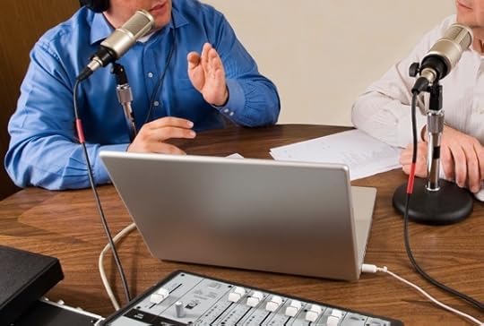 Two Businessmen Recording a Podcast - Photo courtesy of ©iStockphoto.com/eezsnow, Image #3868197
