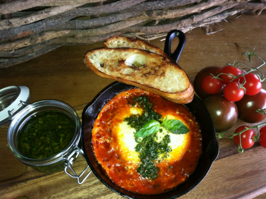 Baked eggs – ready to be topped with salsa verde