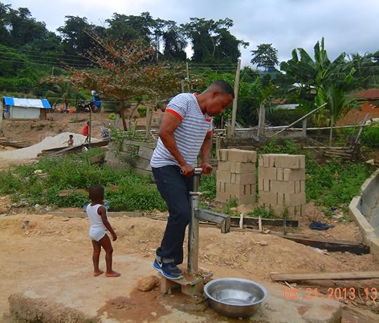 WHILE AT ONE VILLAGE, I COULDN'T RESIST TRYING THE WATER PUMP