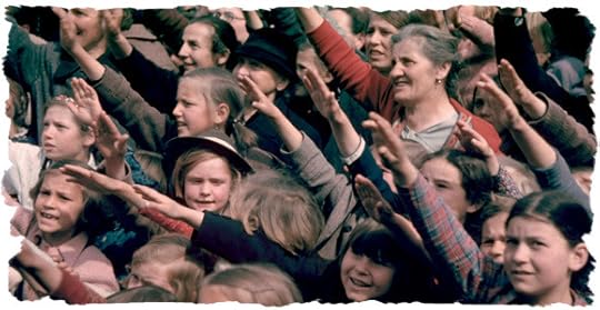 Happy and excited crowds saluting German