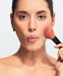 model-brushing-makeup_300