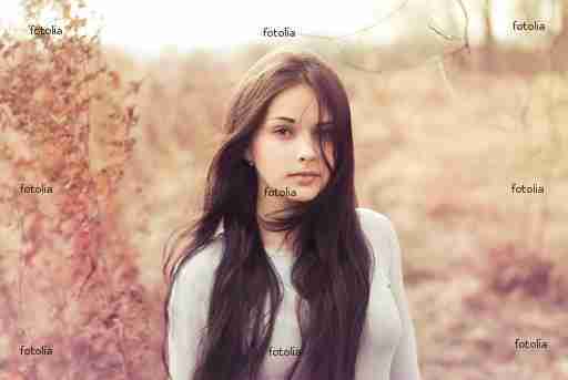 beautiful young woman outdoors in the spring