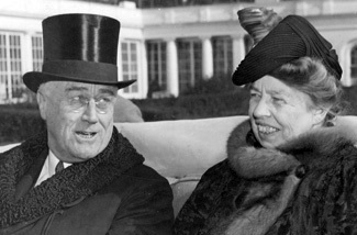 Former President Franklin Delano Roosevelt and wife, Eleanor, riding together.