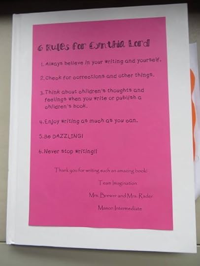 Photo: One of the teams at my school visit today made me a lovely book full of their thoughts and artwork about Rules, and they included 6 rules for ME on the cover. Given that my novel-in-progress has a title of BEE DAZZLED, I'm taking Number 5 as a very good omen. :)