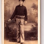 Another US Army bugler, photographed at Fotografia Pertierra, a studio located at Calle Corriedo 2, Manila.