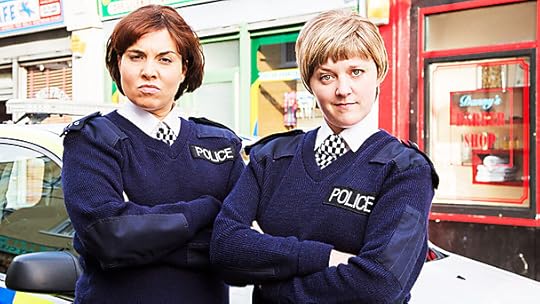 Ingrid Oliver and Lorna Watson dressed as police officers