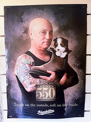 Angry Anderson, a singlet, a puppy and a boot.