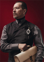 Gary Oldman wearing Prada