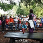 Nora calls the authors together for morning stretches