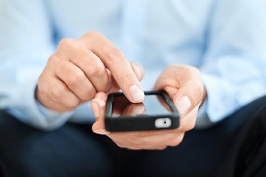 Man Typing into a Smartphone - Photo courtesy of ©iStockphoto.com/TommL, Image #17760721