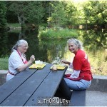 Cooks Heidi and Diana enjoy breakfast outdoors