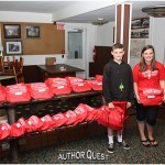 Savannah & Gregory ready to hand out the author backpacks