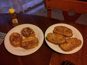 Two versions of the same dish, French toast, with the one gracing an aristocratic table on the left.