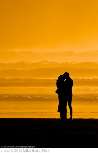 'Lovers embracing on the beach at sundown / sunset on Morro Strand State Beach 10 Jan 2010' photo (c) 2010, Mike Baird - license: http://creativecommons.org/licenses/by/2.0/