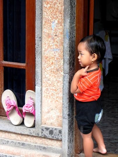 Balinese boy in doorway