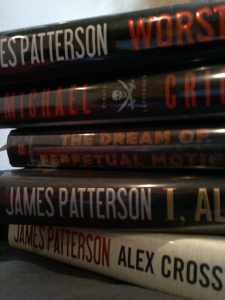 stack of James Patterson mystery novels