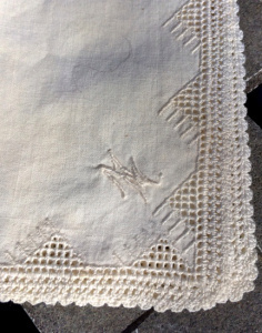 Monogrammed handkerchief, with hemstitching and crochet. Made my my mother for her trousseau. It is all hand work.