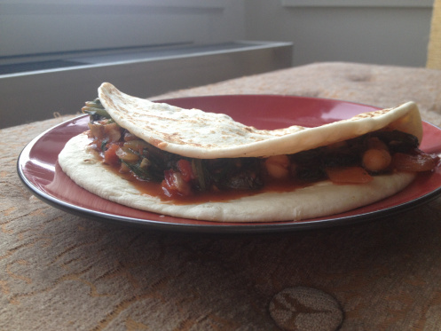 vegan chickpeas, greens, and tomato stew