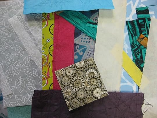 Decorative paper pieces from 100 x 100 Paper Weavings