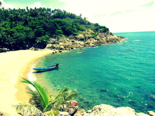 Beach with a boat on Koh Phangan