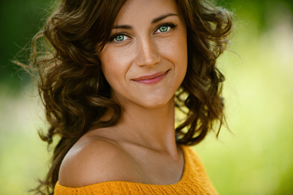 woman close-up in orange sweater