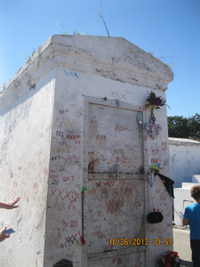 Marie Laveau's tomb. Psst...desecrating the tomb will not make your wish come true. Just sayin'.